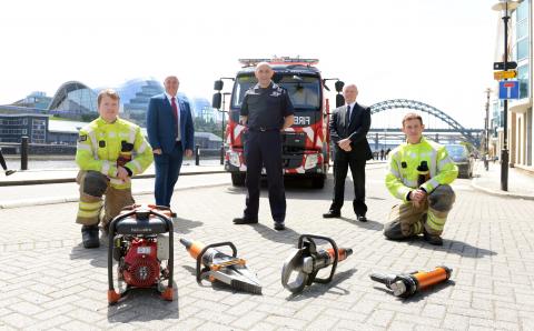 Councillor Ged Bell of Newcastle City Council; DCFO Peter Heath of TWFRS; and Gateshead Councillor Kevin Dodds, a member of the Tyne and Wear Fire and Rescue Authority; with TWFRS firefighters Philip Johnson & Scott Elliott on the Newcastle Quayside