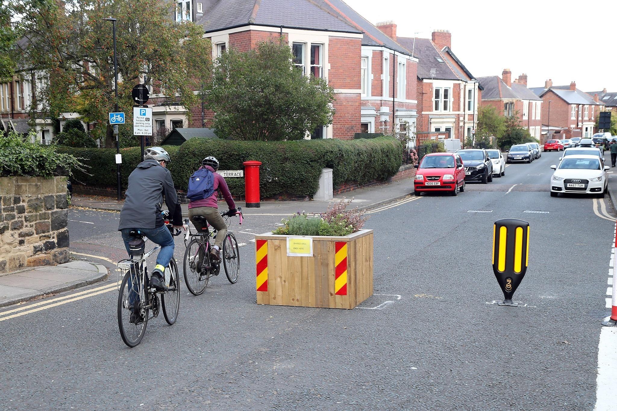 Image of people cycling on Stoneyhurst Bridge