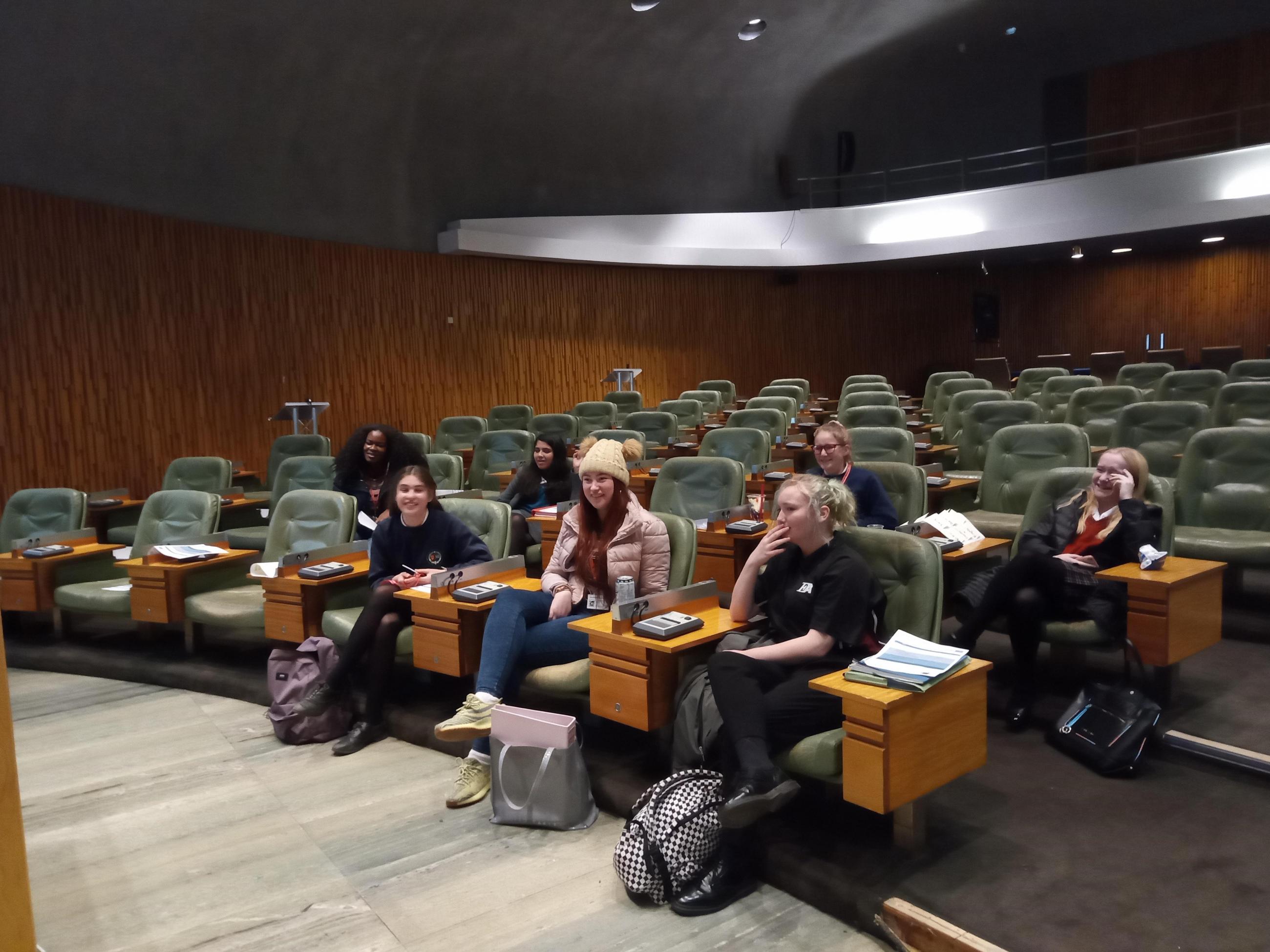 Youth Leaders debating children's rights in the City Council chambers